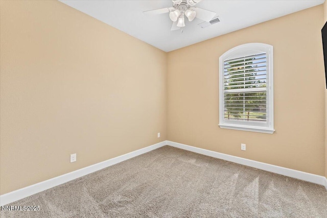 1080 S University Park Loop, Reno, NV 89512 - empty room with a ceiling fan, carpet floors, and baseboards