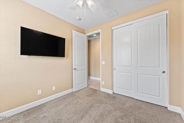 1080 S University Park Loop, Reno, NV 89512 - unfurnished bedroom with carpet flooring, baseboards, a closet, and a ceiling fan