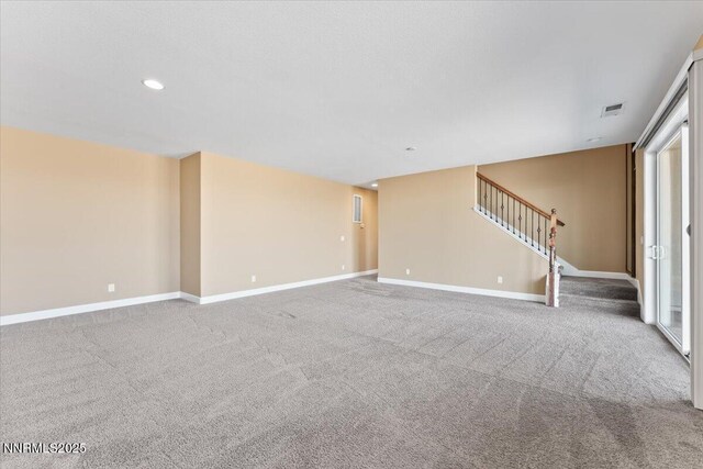 1080 S University Park Loop, Reno, NV 89512 - unfurnished living room with stairway, carpet floors, baseboards, and recessed lighting