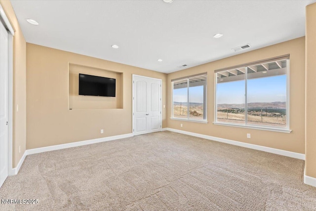 1080 S University Park Loop, Reno, NV 89512 - unfurnished bedroom featuring carpet, a closet, baseboards, and recessed lighting