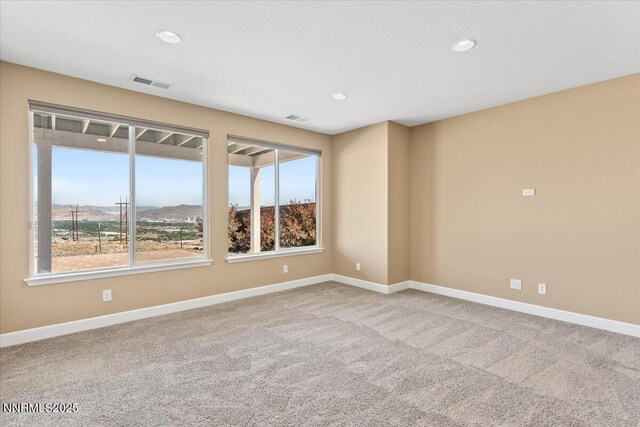1080 S University Park Loop, Reno, NV 89512 - spare room featuring baseboards, carpet flooring, and recessed lighting