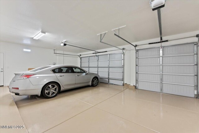 1080 S University Park Loop, Reno, NV 89512 - garage with a garage door opener
