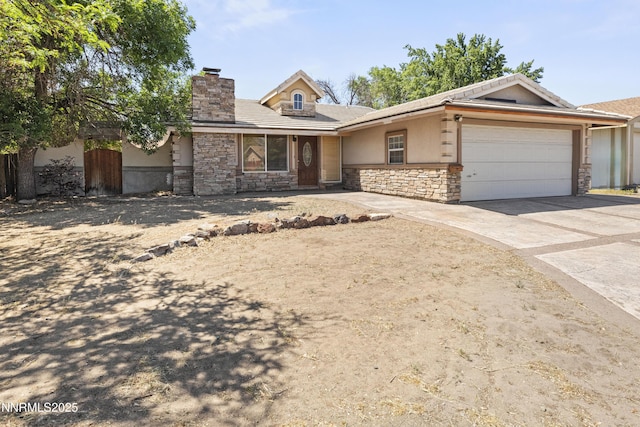 779 E York Way, Sparks, NV 89434 - ranch-style home featuring stone siding, a garage, driveway, a chimney, and stucco siding