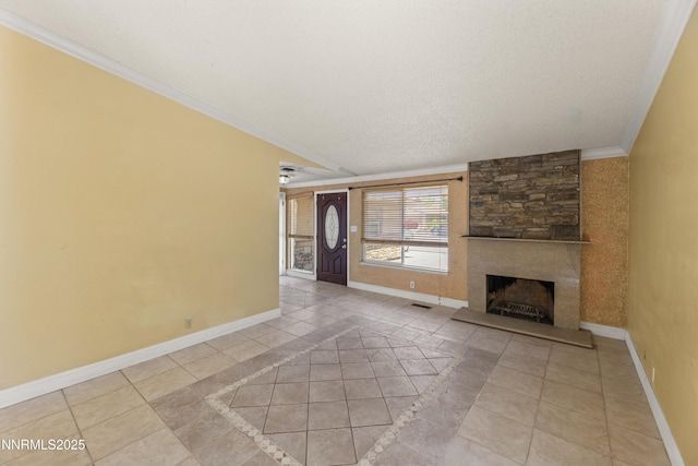 779 E York Way, Sparks, NV 89434 - unfurnished living room with ornamental molding, baseboards, a stone fireplace, light tile patterned floors, and a textured ceiling