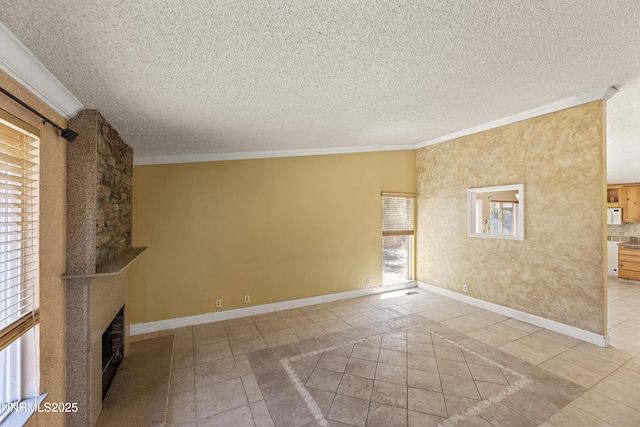 779 E York Way, Sparks, NV 89434 - unfurnished living room featuring crown molding, light tile patterned flooring, a textured ceiling, a fireplace, and inlaid floor details