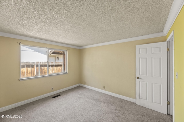 779 E York Way, Sparks, NV 89434 - carpeted empty room featuring a textured ceiling, crown molding, and baseboards