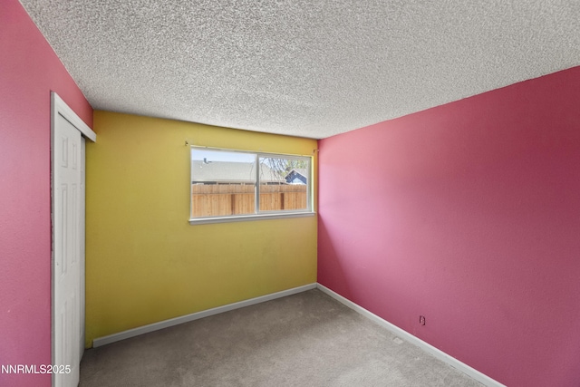 779 E York Way, Sparks, NV 89434 - unfurnished bedroom featuring a closet, a textured ceiling, carpet, and baseboards