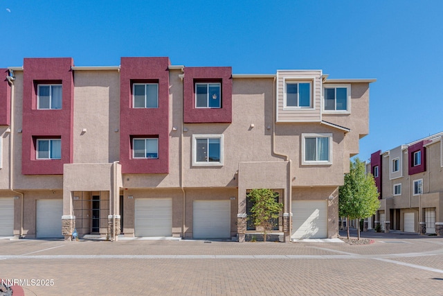 3002 Sterling Ridge Cir, Sparks, NV 89431 - view of front of house featuring stucco siding and an attached garage