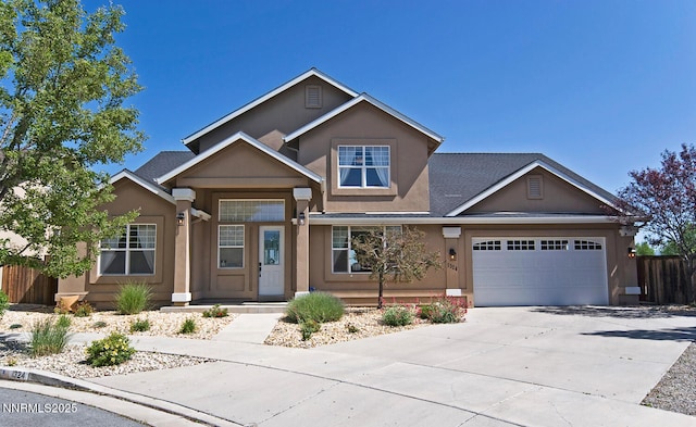 1324 Cedar Creek Cir, Gardnerville, NV 89460 - view of front of house featuring stucco siding, concrete driveway, an attached garage, and roof with shingles