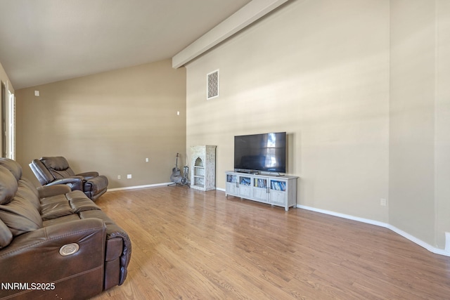 115 Stags Leap Cir, Spanish Springs, NV 89441 - living area featuring wood finished floors and high vaulted ceiling