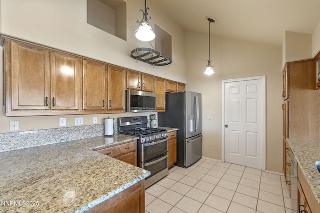115 Stags Leap Cir, Spanish Springs, NV 89441 - kitchen featuring appliances with stainless steel finishes, high vaulted ceiling, brown cabinetry, light tile patterned flooring, and light stone counters
