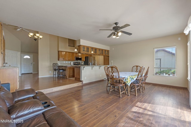 115 Stags Leap Cir, Spanish Springs, NV 89441 - dining space featuring ceiling fan, dark wood-style flooring, and a chandelier