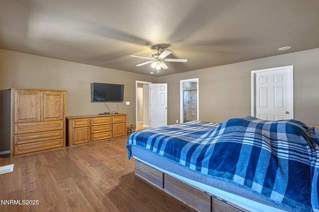 115 Stags Leap Cir, Spanish Springs, NV 89441 - bedroom with dark wood-style flooring and a ceiling fan