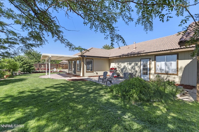 115 Stags Leap Cir, Spanish Springs, NV 89441 - rear view of property featuring a tile roof and a patio