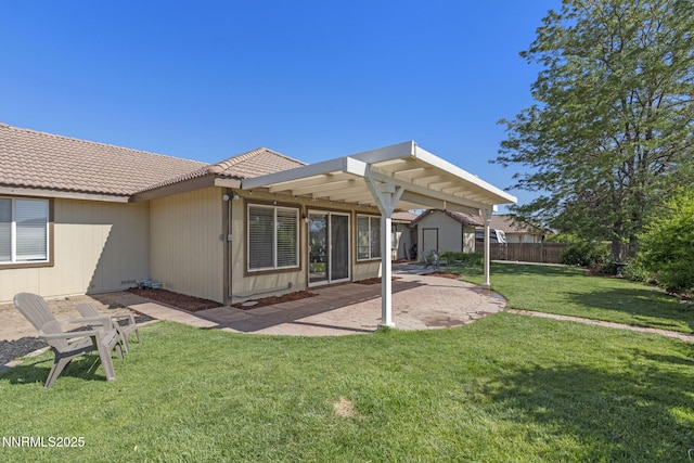 115 Stags Leap Cir, Spanish Springs, NV 89441 - rear view of house featuring a tiled roof, a storage shed, a patio area, and a pergola