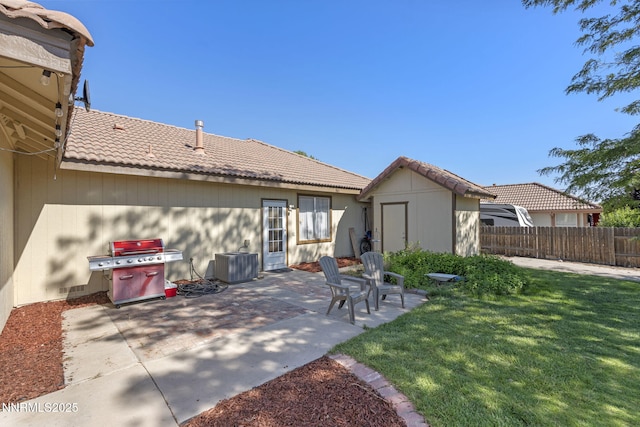 115 Stags Leap Cir, Spanish Springs, NV 89441 - rear view of property with a tile roof and a patio