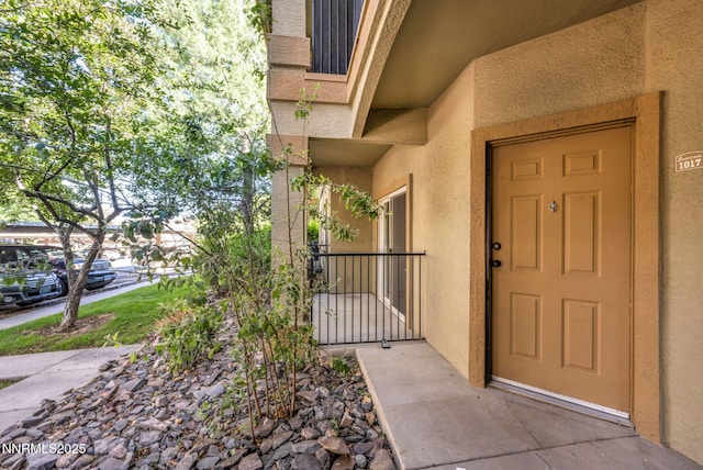 6850 Sharlands Ave # E1017, Reno, NV 89523 - doorway to property featuring stucco siding