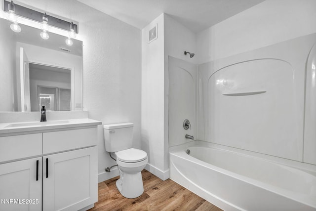 6850 Sharlands Ave # E1017, Reno, NV 89523 - bathroom with vanity, shower / bath combination, and wood finished floors