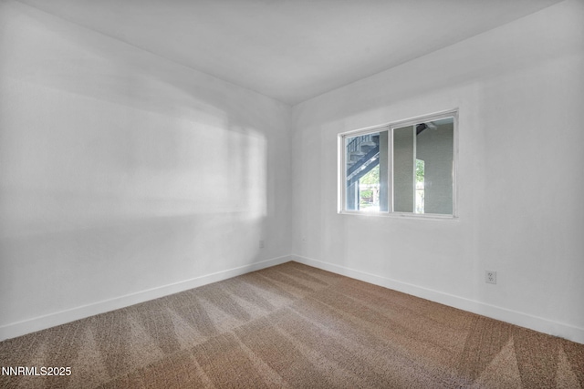 6850 Sharlands Ave # E1017, Reno, NV 89523 - spare room featuring carpet flooring and baseboards