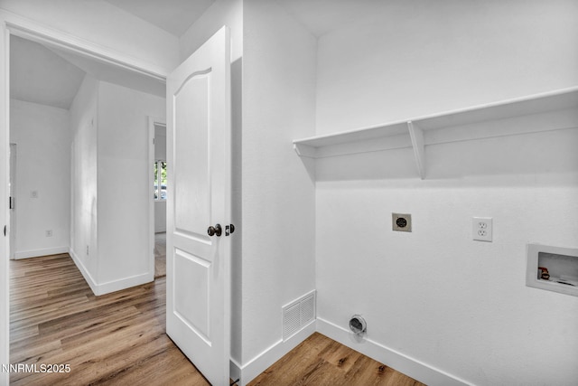 6850 Sharlands Ave # E1017, Reno, NV 89523 - washroom with hookup for an electric dryer, hookup for a washing machine, and wood finished floors