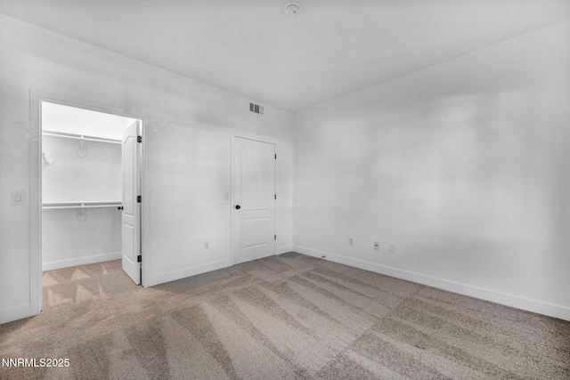 6850 Sharlands Ave # E1017, Reno, NV 89523 - unfurnished bedroom with carpet and a spacious closet
