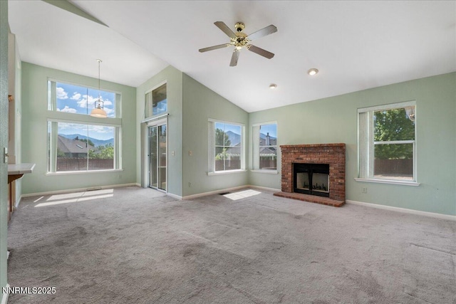 1290 Saddlehorn Ct, Minden, NV 89423 - unfurnished living room featuring healthy amount of natural light, high vaulted ceiling, a brick fireplace, and carpet floors