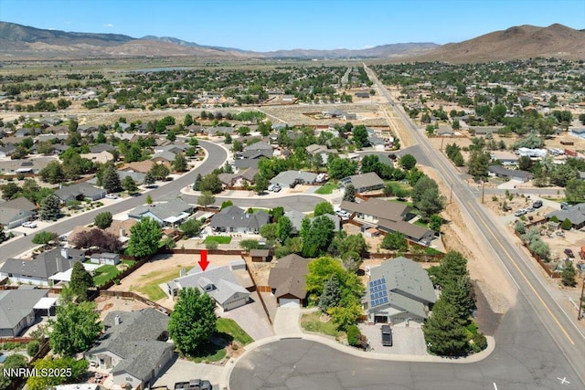 1290 Saddlehorn Ct, Minden, NV 89423 - aerial view of property and surrounding area featuring a mountain backdrop and nearby suburban area