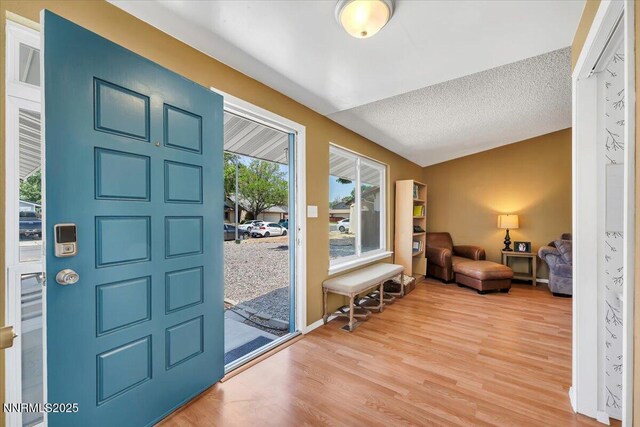 809 Glen Valley Dr, Sparks, NV 89434 - entrance foyer with wood finished floors and a textured ceiling