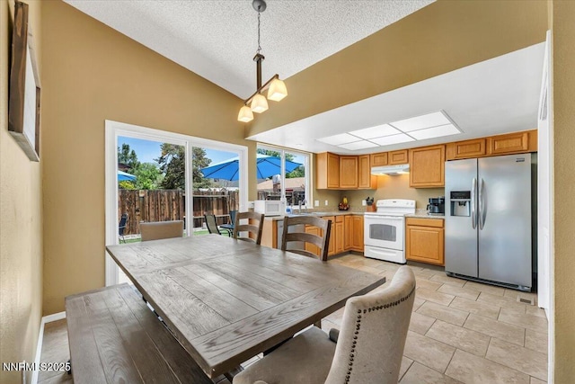 809 Glen Valley Dr, Sparks, NV 89434 - dining area with lofted ceiling and a textured ceiling