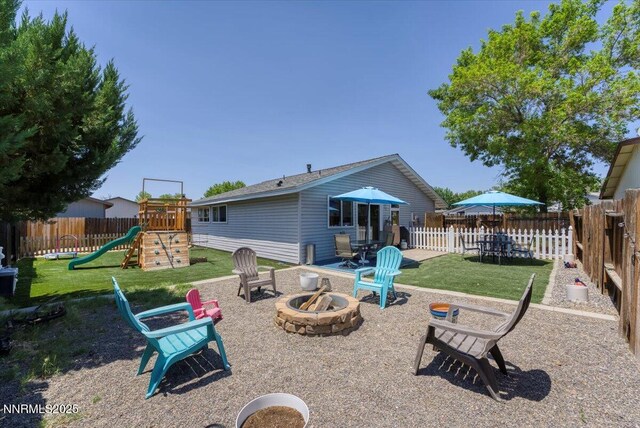 809 Glen Valley Dr, Sparks, NV 89434 - back of property featuring an outdoor fire pit and a playground