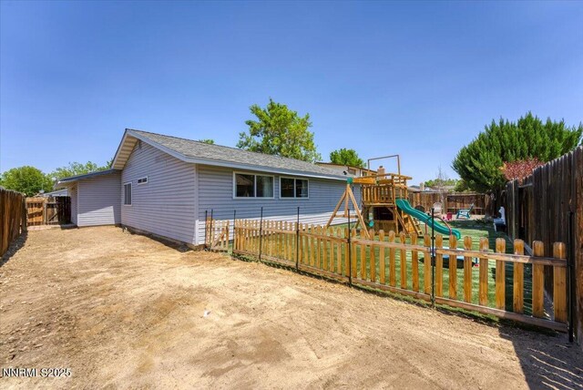 809 Glen Valley Dr, Sparks, NV 89434 - rear view of property with a playground and a fenced backyard