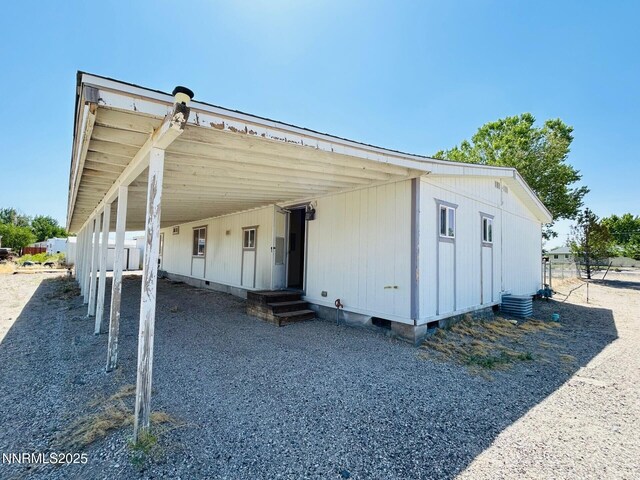 6480 Teal Dr, Fallon, NV 89406 - manufactured / mobile home featuring a carport