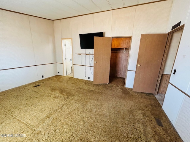 6480 Teal Dr, Fallon, NV 89406 - unfurnished bedroom with carpet flooring, a closet, and crown molding