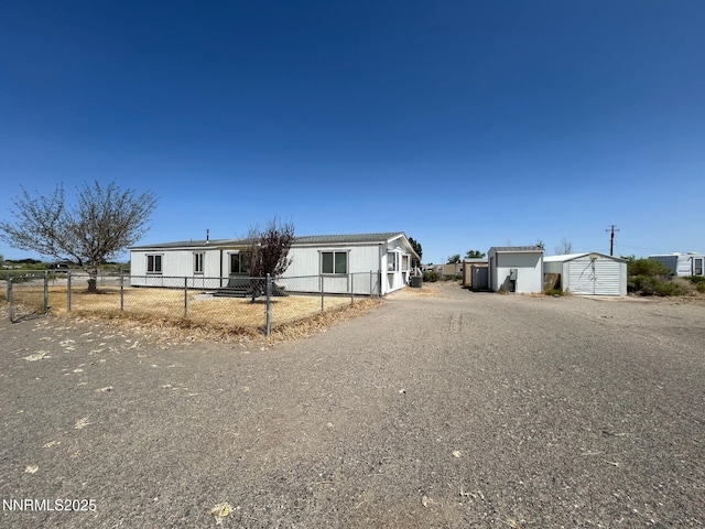 6480 Teal Dr, Fallon, NV 89406 - manufactured / mobile home featuring an outbuilding