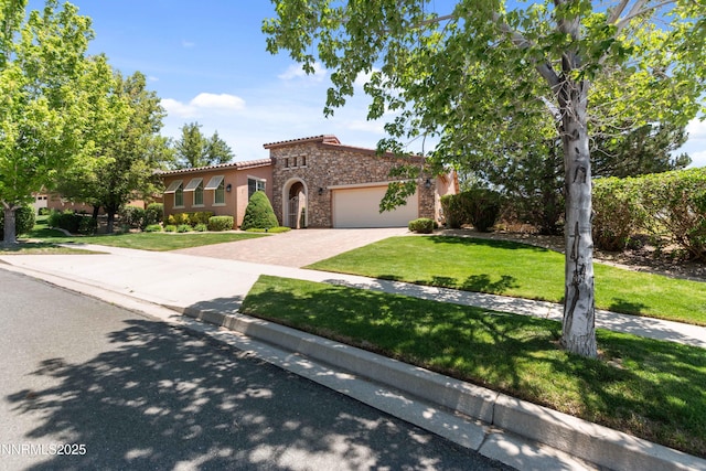 7601 Autumn Ridge Cir, Reno, NV 89523 - mediterranean / spanish-style house with stone siding, a garage, a front lawn, and driveway
