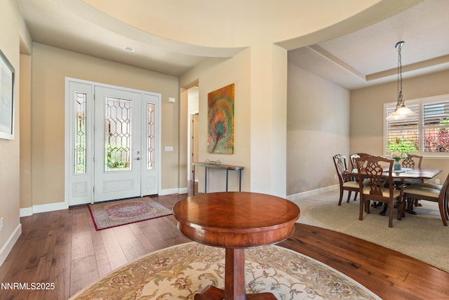 7601 Autumn Ridge Cir, Reno, NV 89523 - foyer entrance featuring dark wood finished floors and a raised ceiling