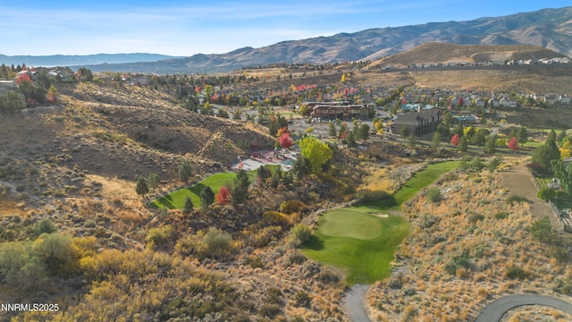 7601 Autumn Ridge Cir, Reno, NV 89523 - aerial overview of property's location featuring a mountain backdrop and a local golf course