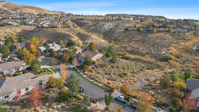 7601 Autumn Ridge Cir, Reno, NV 89523 - aerial view of property's location with nearby suburban area and a mountainous background