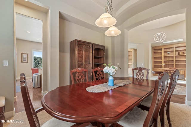 7601 Autumn Ridge Cir, Reno, NV 89523 - dining space with built in shelves and wood finished floors