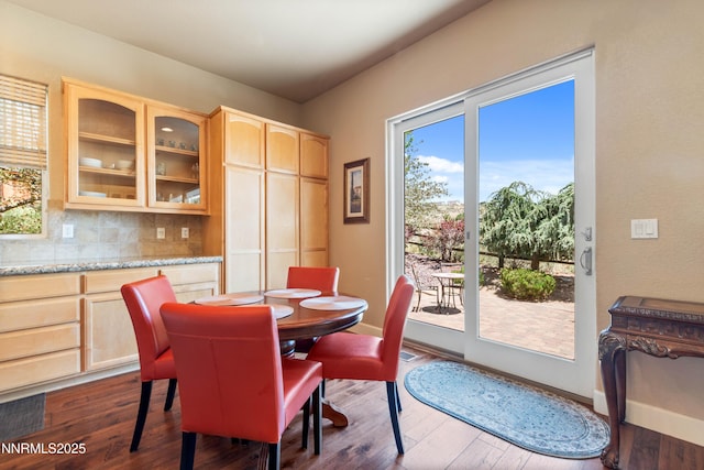 7601 Autumn Ridge Cir, Reno, NV 89523 - dining area featuring dark wood-type flooring and baseboards