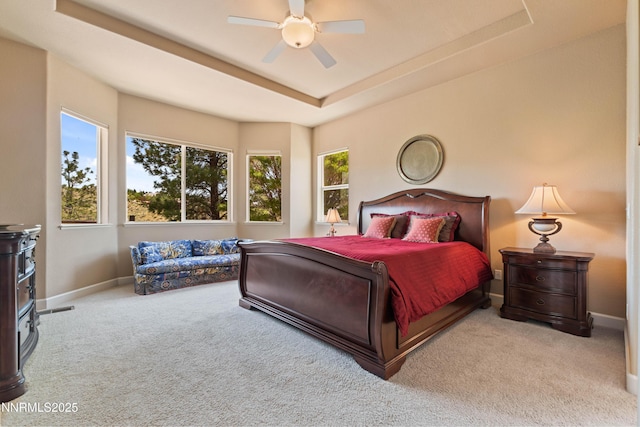 7601 Autumn Ridge Cir, Reno, NV 89523 - carpeted bedroom with a raised ceiling and a ceiling fan