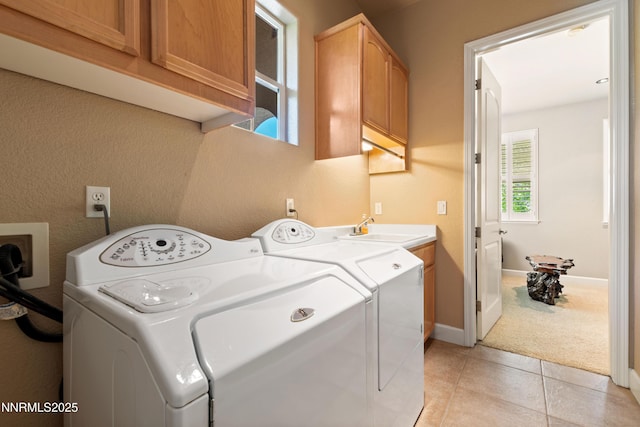 7601 Autumn Ridge Cir, Reno, NV 89523 - washroom featuring cabinet space, independent washer and dryer, light carpet, and light tile patterned floors