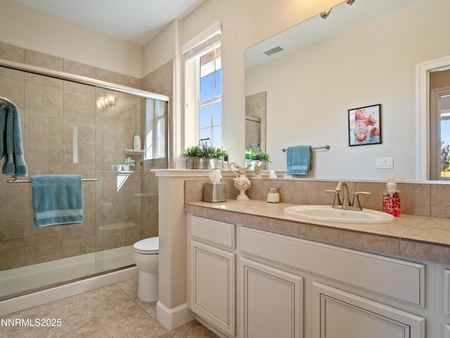 1221 Lasso Ln, Gardnerville, NV 89410 - bathroom with vanity, a shower stall, and tile patterned flooring
