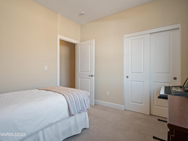 1221 Lasso Ln, Gardnerville, NV 89410 - bedroom featuring light colored carpet and a closet