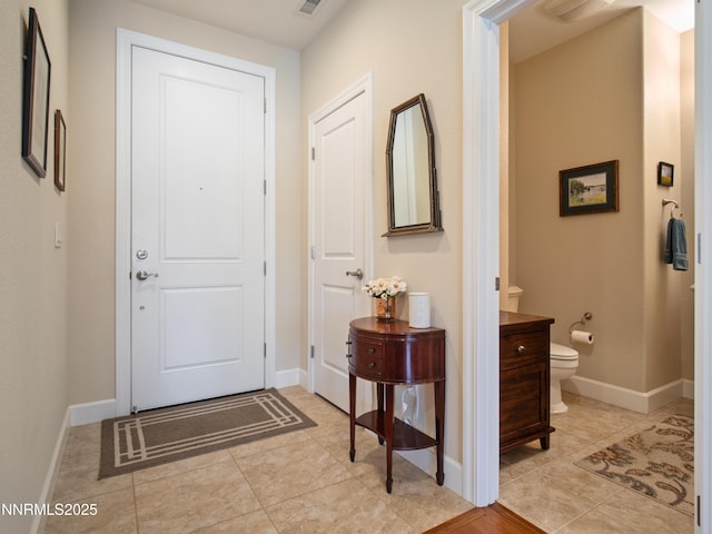 1221 Lasso Ln, Gardnerville, NV 89410 - foyer entrance featuring baseboards and light tile patterned floors