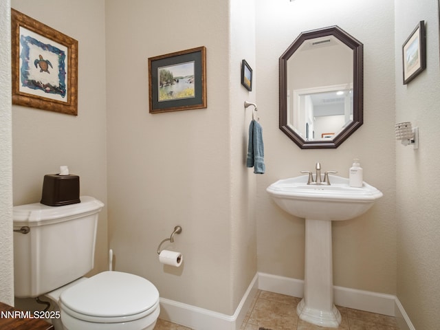 1221 Lasso Ln, Gardnerville, NV 89410 - half bathroom featuring toilet and tile patterned flooring
