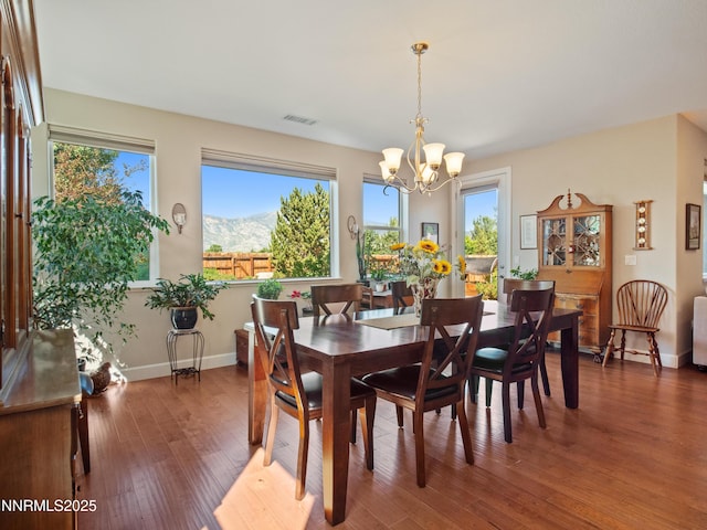 1221 Lasso Ln, Gardnerville, NV 89410 - dining room with a chandelier and wood finished floors
