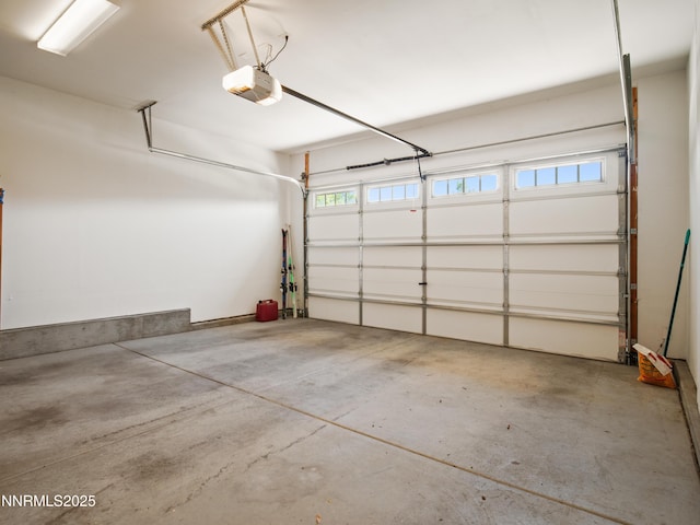 1221 Lasso Ln, Gardnerville, NV 89410 - garage featuring a garage door opener