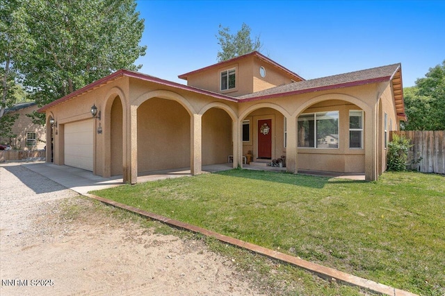 805 Samantha Cir, Fallon, NV 89406 - mediterranean / spanish house with stucco siding, an attached garage, and driveway