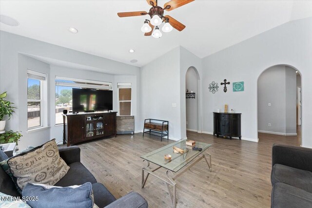 805 Samantha Cir, Fallon, NV 89406 - living area featuring arched walkways, ceiling fan, vaulted ceiling, wood finished floors, and recessed lighting